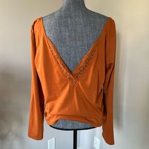 Burnt orange v neck with lace detail